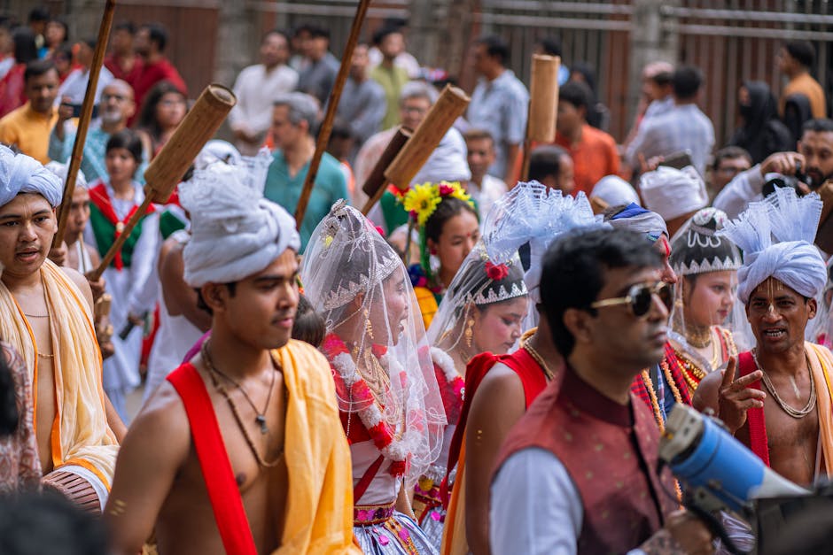 Vibrant cultural parade with participants in traditional attire and accessories, capturing the essence of a colorful festival.