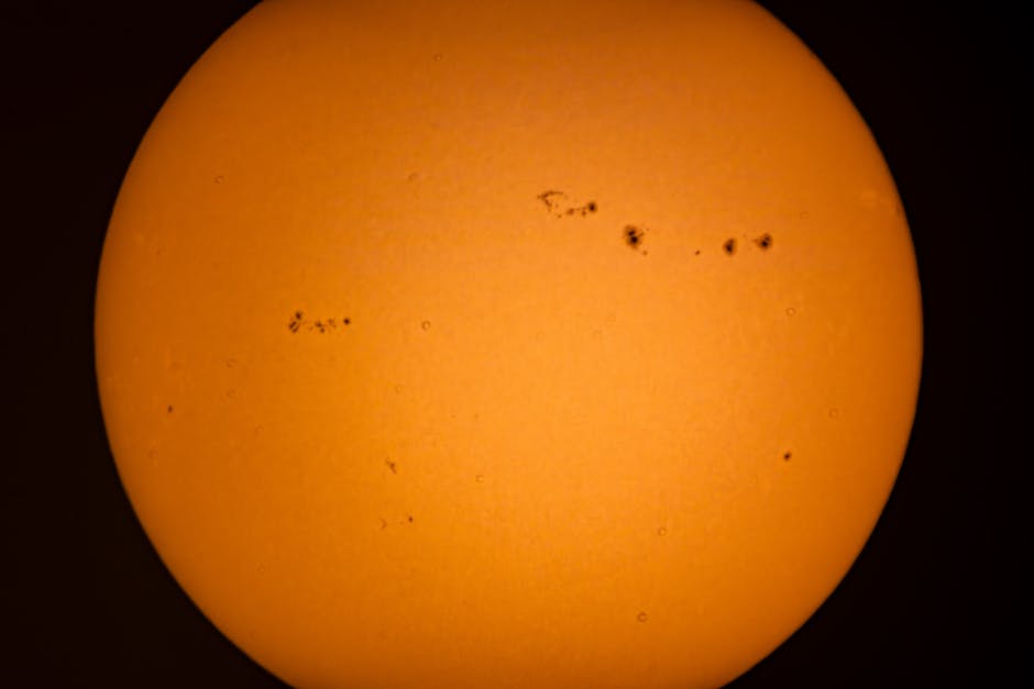 A high-resolution image capturing the Sun's surface with visible sunspots, ideal for astronomical study.